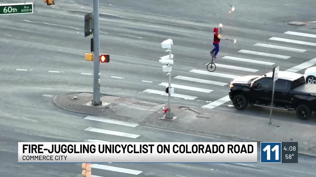 Fire-juggling unicyclist spotted at busy intersection, police say