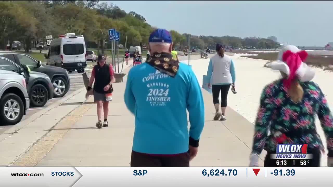 Dozens of runners gather along Mississippi Sound for national