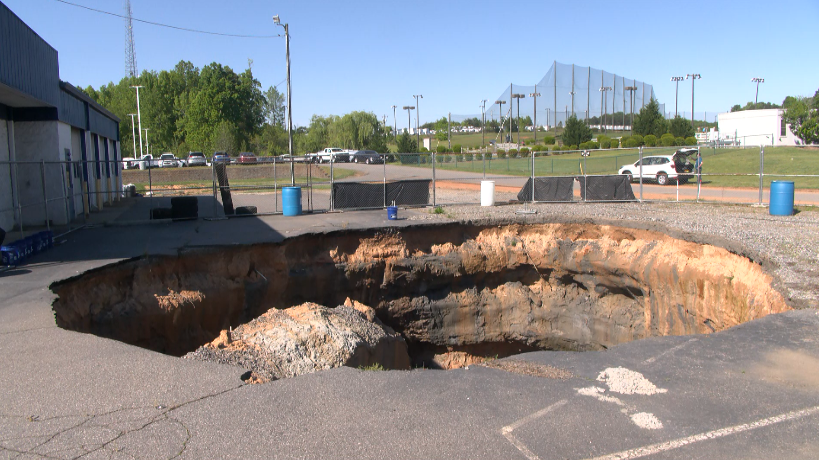 It's hard': Massive sinkhole craters Mooresville business owner's