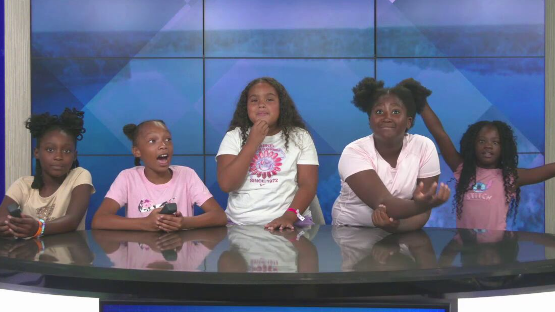 Fourth graders from Girls Place visit WCJB TV20