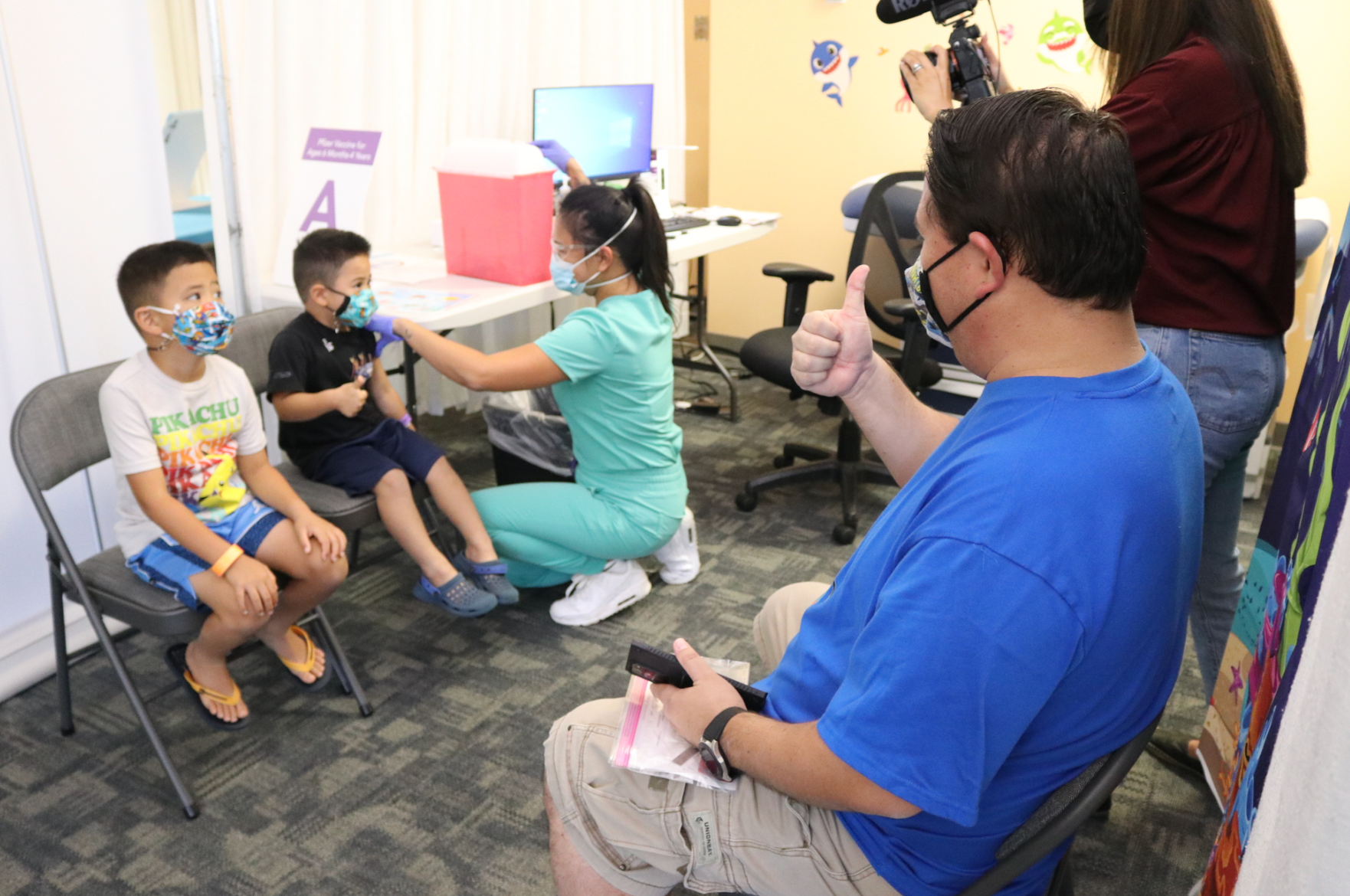 Parents welcome FDA approval of new COVID booster for kids image